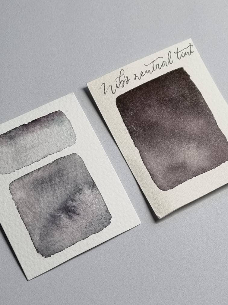 Handmade vegan watercolour paint | Nib's Neutral Tint | dark grey black, purple, green