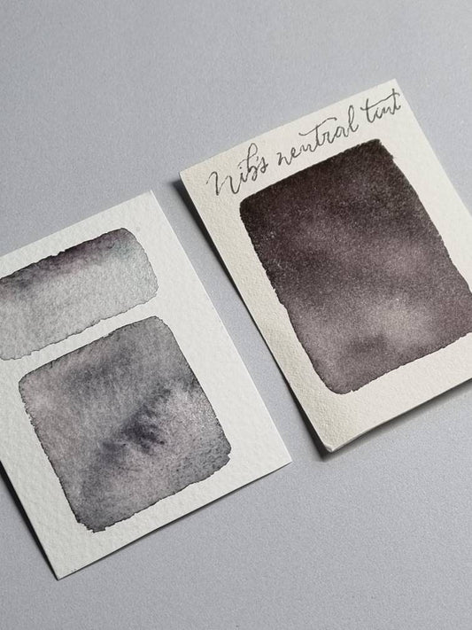 Handmade vegan watercolour paint | Nib's Neutral Tint | dark grey black, purple, green