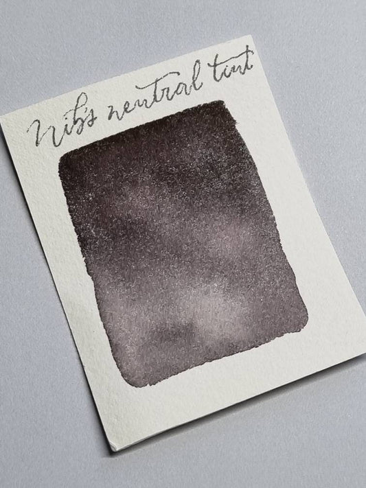 Handmade vegan watercolour paint | Nib's Neutral Tint | dark grey black, purple, green